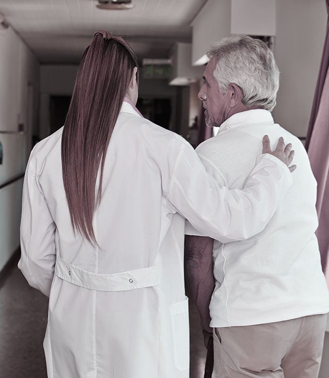 A doctor and a patient walk
